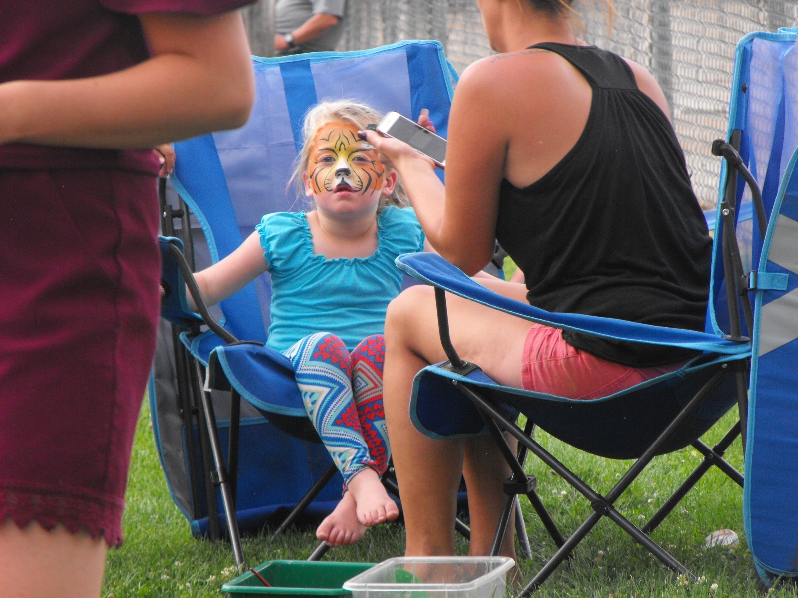 Girl getting face painting at one of Riverton Wyoming's many events