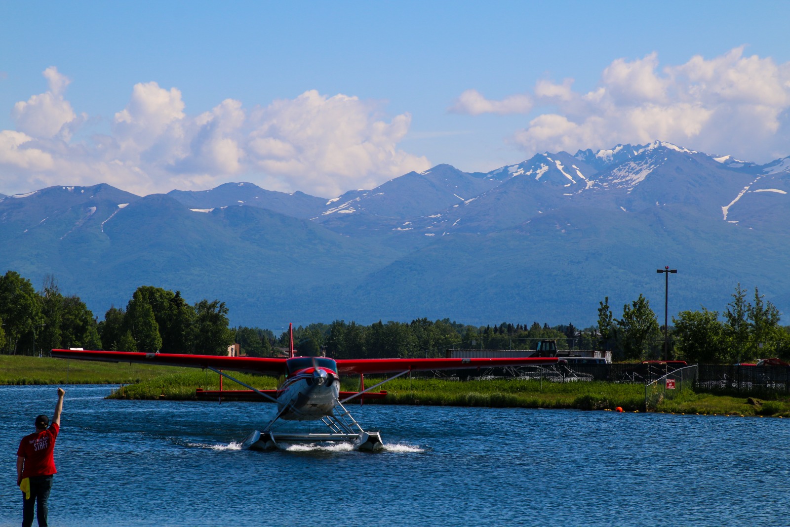 Float plane leaving the water in Alaska.