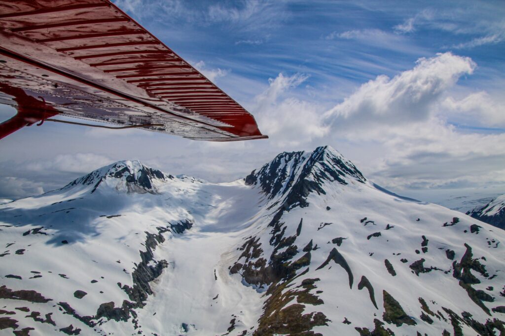 Flying in a float plane above the Alaska Range mountains.
