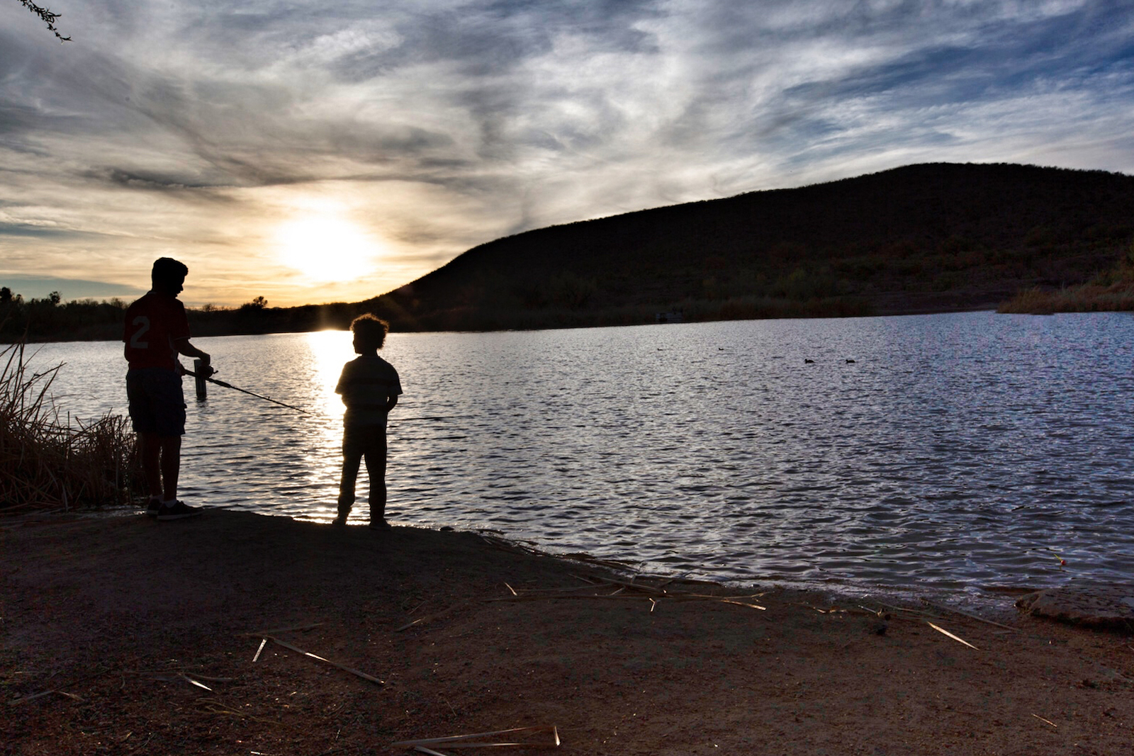 adult and child fishing at Patagonia Lake State Park