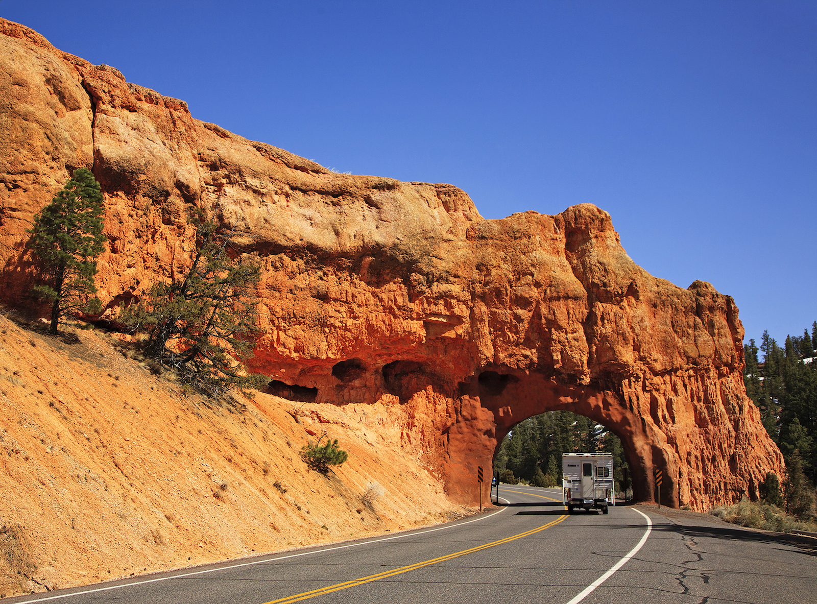 Truck with camper on Highway 12 Scenic Bypass in Utah