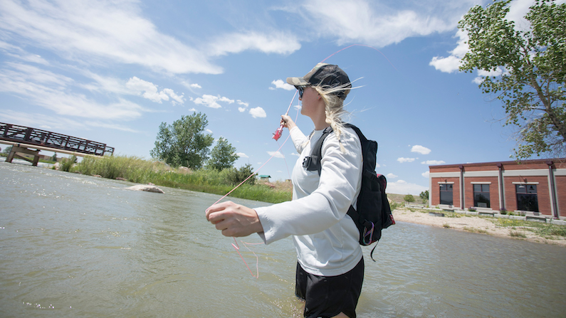Woman fishing North Platte River in Casper Wyoming