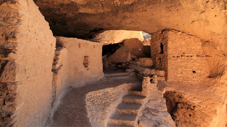 Stairs and multiple rooms in a cliff dwelling at Gila Cliff Dwellings National Monument