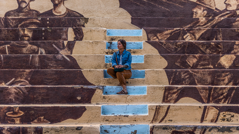 woman sitting on staircase in Bisbee