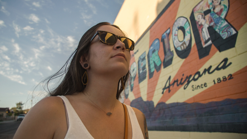 woman looking at mural