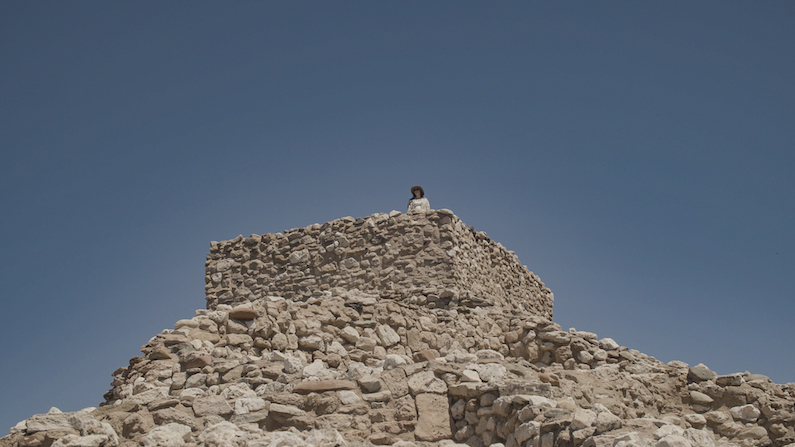 Person standing at the top of Tuzigoot National Monument in Cottonwood Arizona