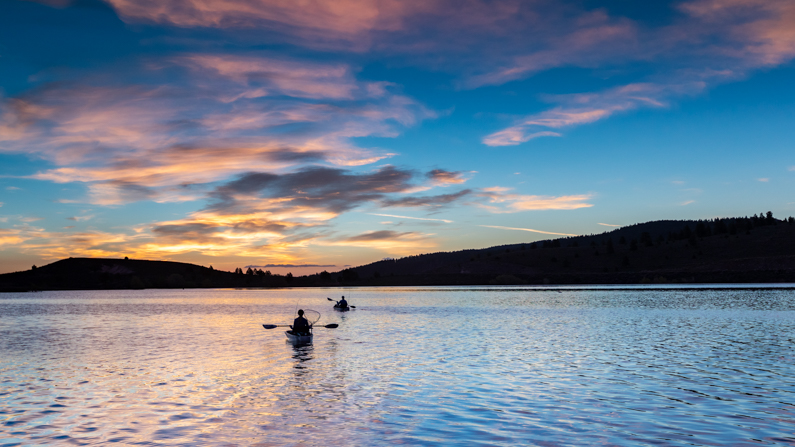Kayakers on Panguitch Lake at sunset