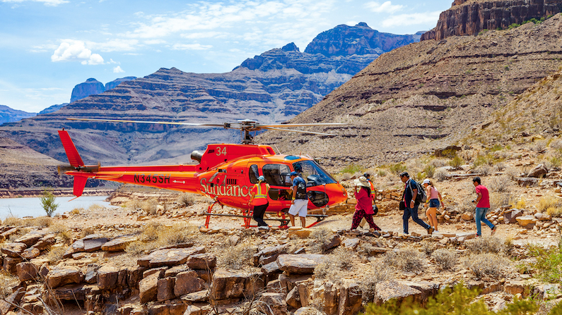 People boarding a helicopter for a tour in Grand Canyon West