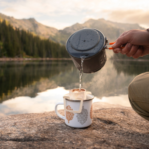 A cup of tea by the lake while hiking